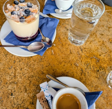 Cheesecake Parfait cup with blueberries and espresso from The Blue Fox in Mithymna, Greece