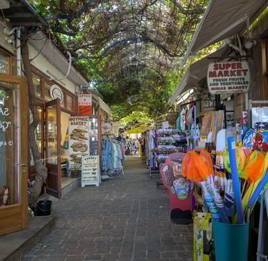 cobblestone streets  and store frounts in Petra, Greece
