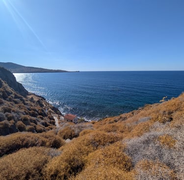 beautiful view of the North Aegean Sea from a trail in Petra Greece