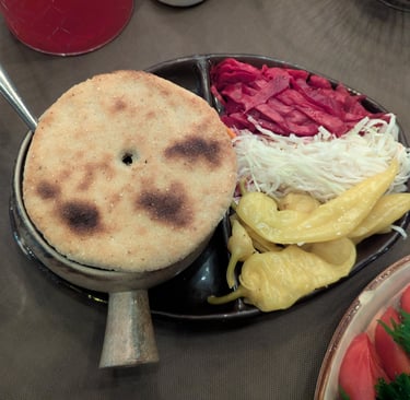 lobio with bread and pickeled vegetables from Vafe Daphna in Tbilisi Georgia 