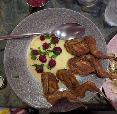 Fried quail with Tashmijabi from Cafe daphna in tbilisi Georiga