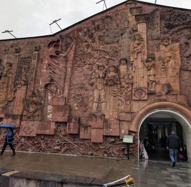 Terra cotta relief sculpted by Bernard Nebieridze on the exterior wall of the Green  Bazaar in 