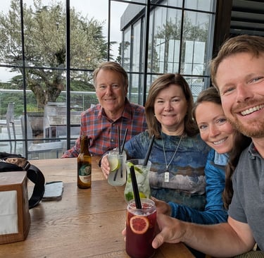 family enjoying drinks at Tares restaurant above the Grand Opera Hotel in Kutaisi Georgia 