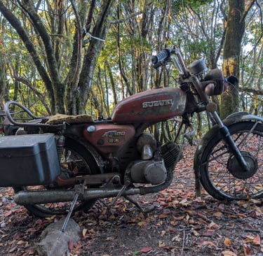 a famous abandoned Suzuki motorcycle on forest rd 730 in Taiwan