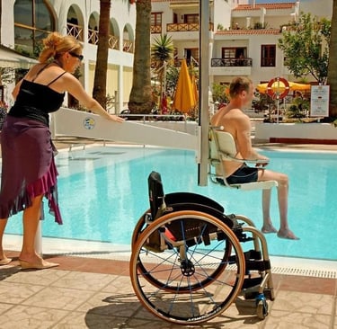 a woman in a wheelchair wheel chair next to a man in a wheelchair