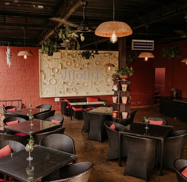 a restaurant with wicker chairs and tables