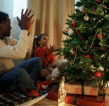 A beautifully decorated Christmas tree with sparkling lights, colorful ornaments, and a star on top,