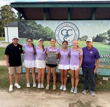 a santa clause is holding a christmas card