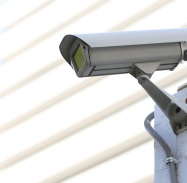 a camera mounted to a wall of a building