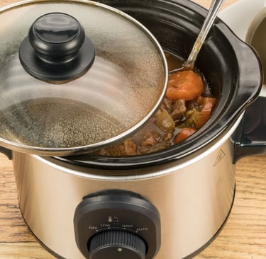 a potted potted with a potted carrots and a spoon