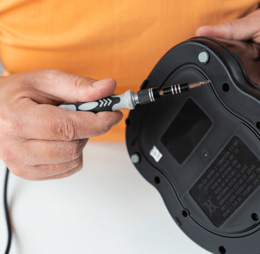 a man is holding a guitar and a guitar