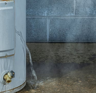 a water heater with a hose attached to it