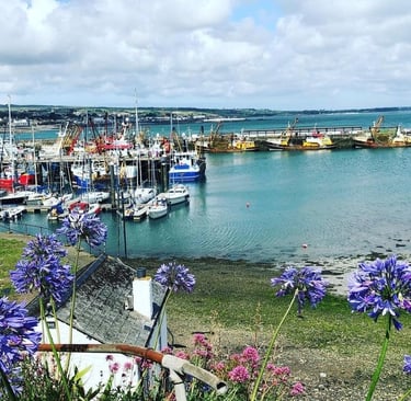 Fishing port Cornish seaside with boats on the harbour 