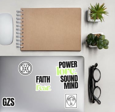 a laptop computer sitting on a desk with a notebook and a notebook