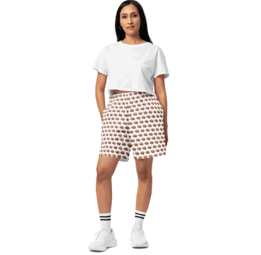 model wearing workout shorts with an all over print of a brain