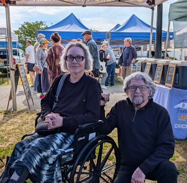 Greg Rowland and Linda Najera at the Carrboro Farmer's Market