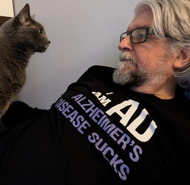 Greg Rowland with his cat Big Bit