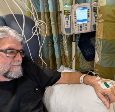 Greg Rowland receiving a Lecanemab infusion at Duke Health