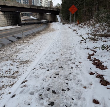 snow on road near Duke Health