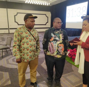 a man and woman standing in a room