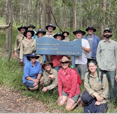 Bushcare volunteers pose for group photo in the reserve