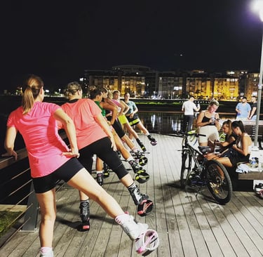 a group of women kangoo jump in KLCC