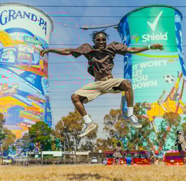 Kofi Dotse jumping into the sky at Soweto Towers