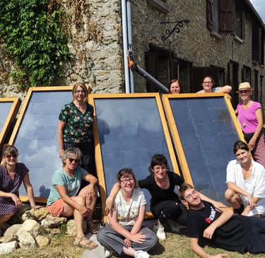 a group of people standing around a solar paneled window