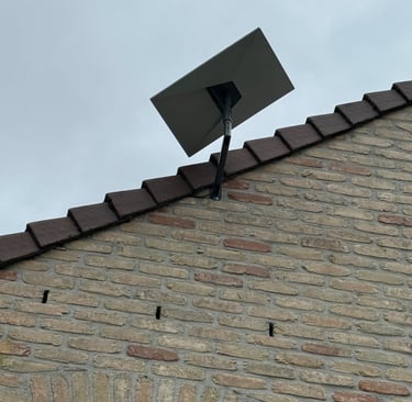 Antenne Starlink montage sur façade