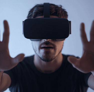 a man in a black shirt and a virtual reality