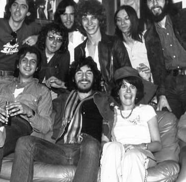 Charlie Kendall and Bruce Springsteen with the Staff of WMMS in Cleveland.