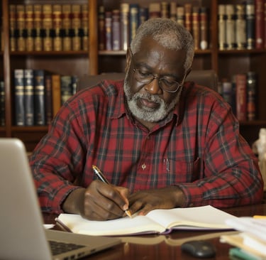 Retired man writing his memoir as his legacy.
