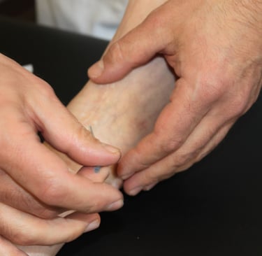 Dr. Robert Inesta treating fascial injury.