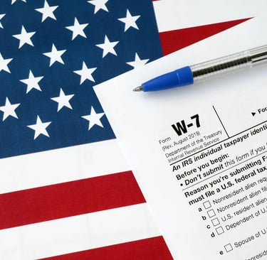 a pen. W-7. Itin number. Taxes. Accounting. ITIN Number in USA