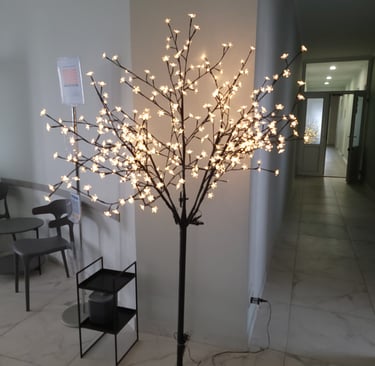 a tree with white lights on it