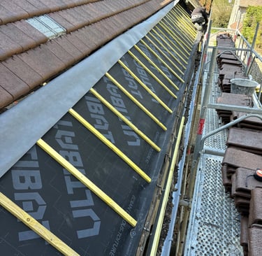Travaux de couverture générale réalisés par MF Couverture à Puteaux (92) - Pose de sous-toiture et liteaux
