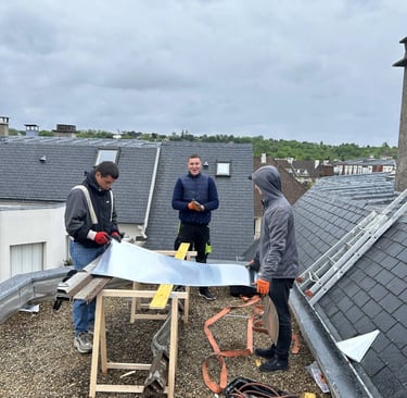 Travaux de zinguerie sur toiture en zinc à Puteaux (92) réalisés par l’équipe MF Couverture