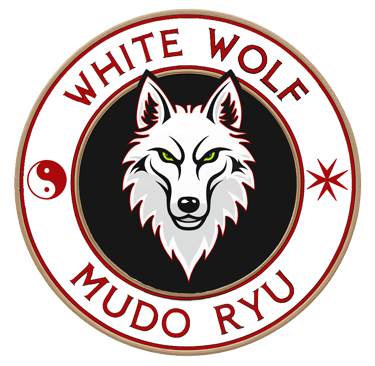 a white wolf logo with a red and white wolf