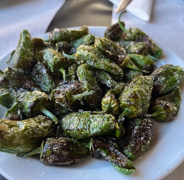 a plate of food with a fork and knife on it