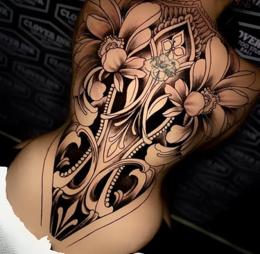 The Clover Ink tattoo artist inking tourist in Bali