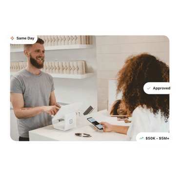 a man and woman are shown on a phone