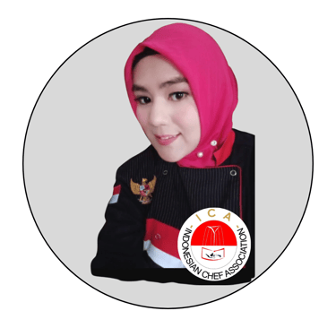 a woman in a pink hijab wearing a pink hijab