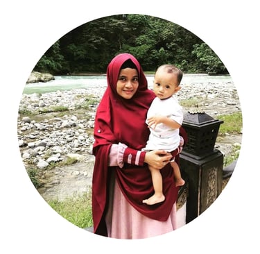 a woman in a red hijab wearing a red hijab