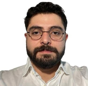 a man with a beard and glasses on his head