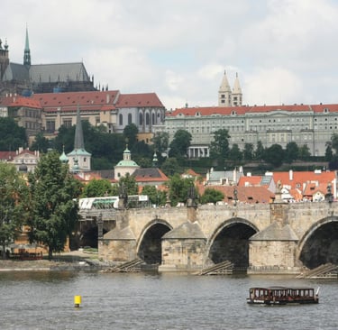 Prague city skyline with Charles Bridge and historic castle