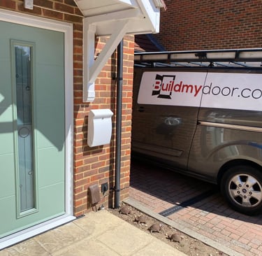a chart well green front door with long glass panel and the buildmydoor van