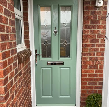 a new chartwell green l front door on red brick house installed by buildmydoor