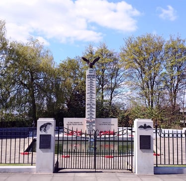 Polish War Memorial at South Ruislip, Hillingond, London. Tall white column, eagle on top.