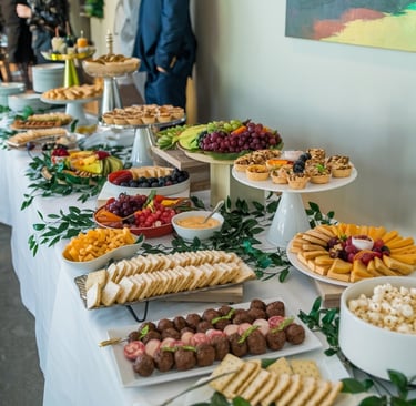 A photo of a table filled with party appetizers.