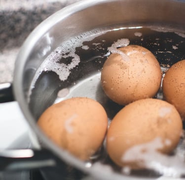 eggs boiling in a pot
